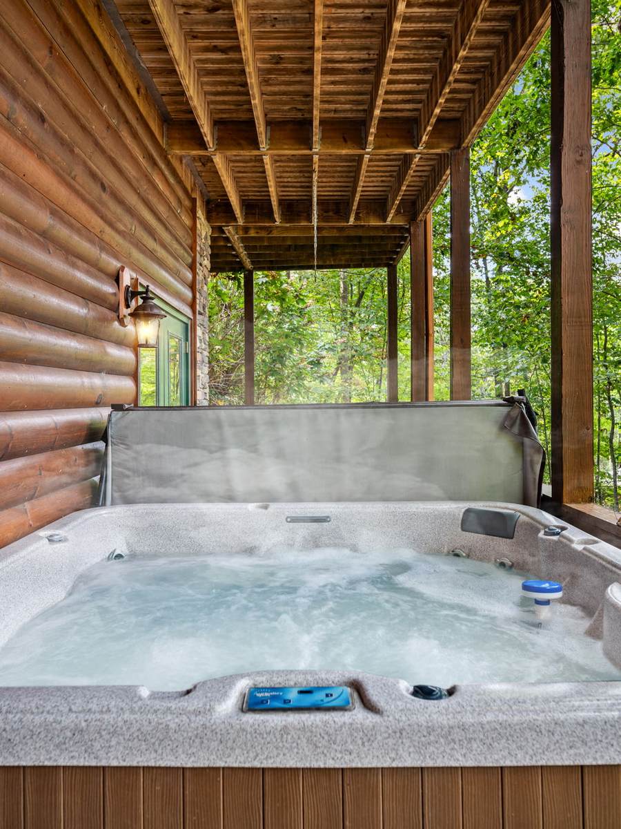 The six-person hot tub on the covered lower deck