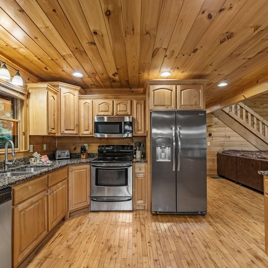 Kitchen with granite counters and stainless appliances